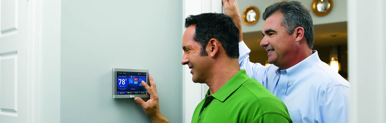 Hvac Tech Showing Homeower How To Use Thermostat Hvac Tech Showing Homeower How To Use Thermostat
