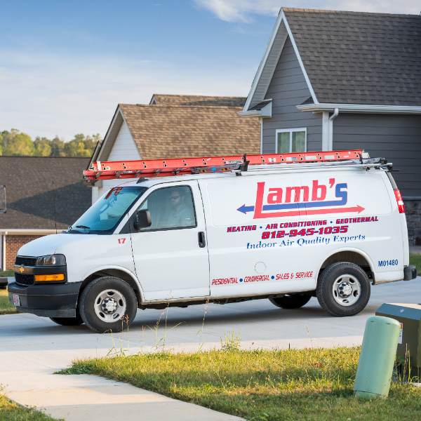 Lambs Heating And Air Conditioning Tech In Company Van
